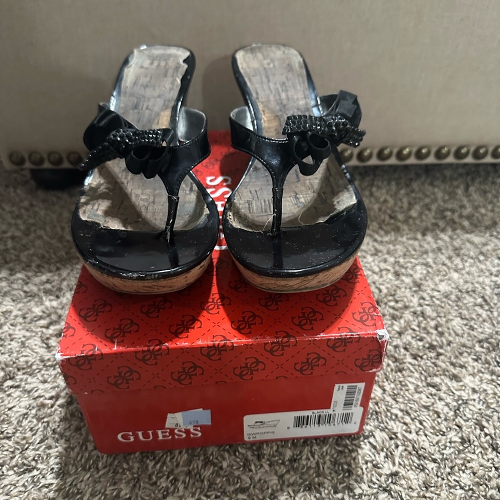 Black patent Guess wedge sandal.